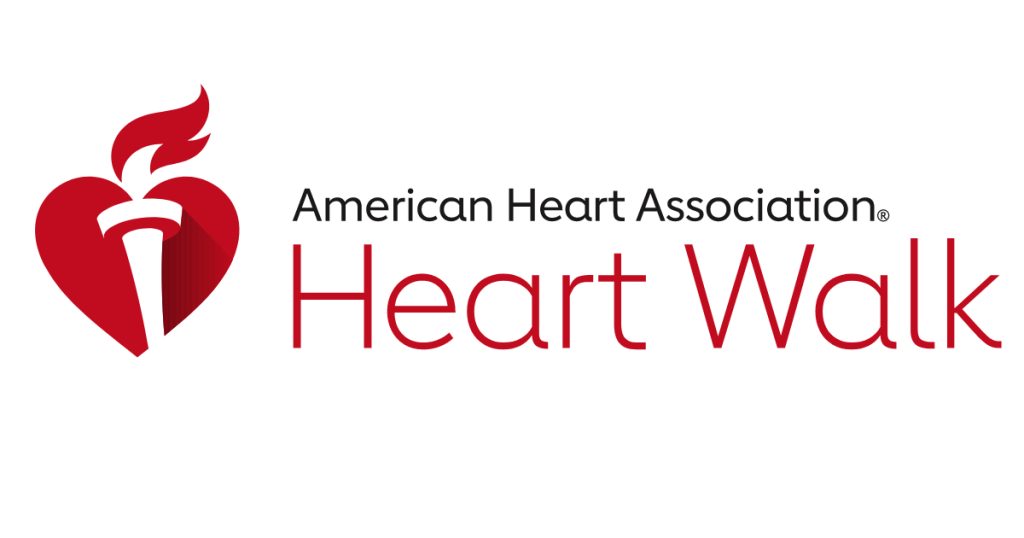 Red heart and torch logo with text "American Heart Association Heart Walk" in black and red, promoting a community event focused on heart health awareness.